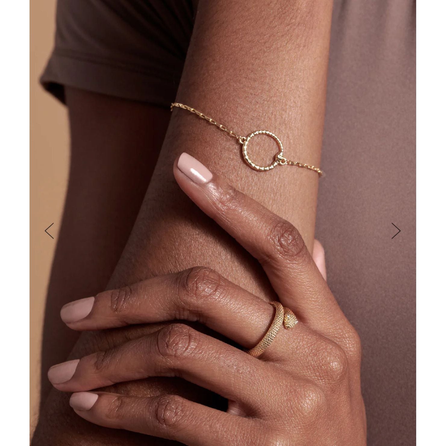 Gold bracelet shown on model