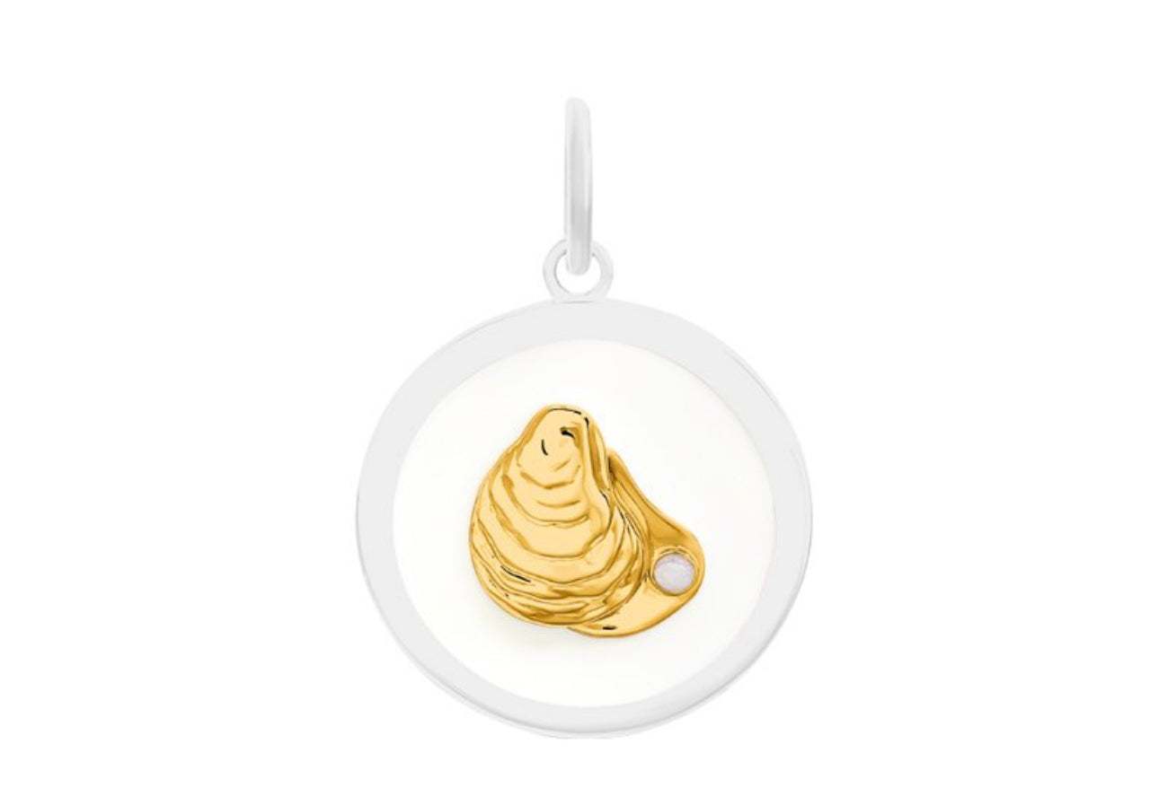 sterling silver with enamel inlay.
Showing white pendant with gold oyster and pearl in oyster 
Pearl is made from pearlized enamel.
Our gold plated jewelry is .925 sterling silver plated in 24K yellow gold
Our silver jewelry is 925 sterling silver.