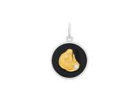 Showing black enamel and gold oyster with pearl