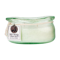 The Windward Collection features a unique hand-blown vessel with an artisan-rolled rim. This vessel is brimming with bubbles below the surface. No two artisan vessels are alike. The fragrances evoke the flora of the sea.