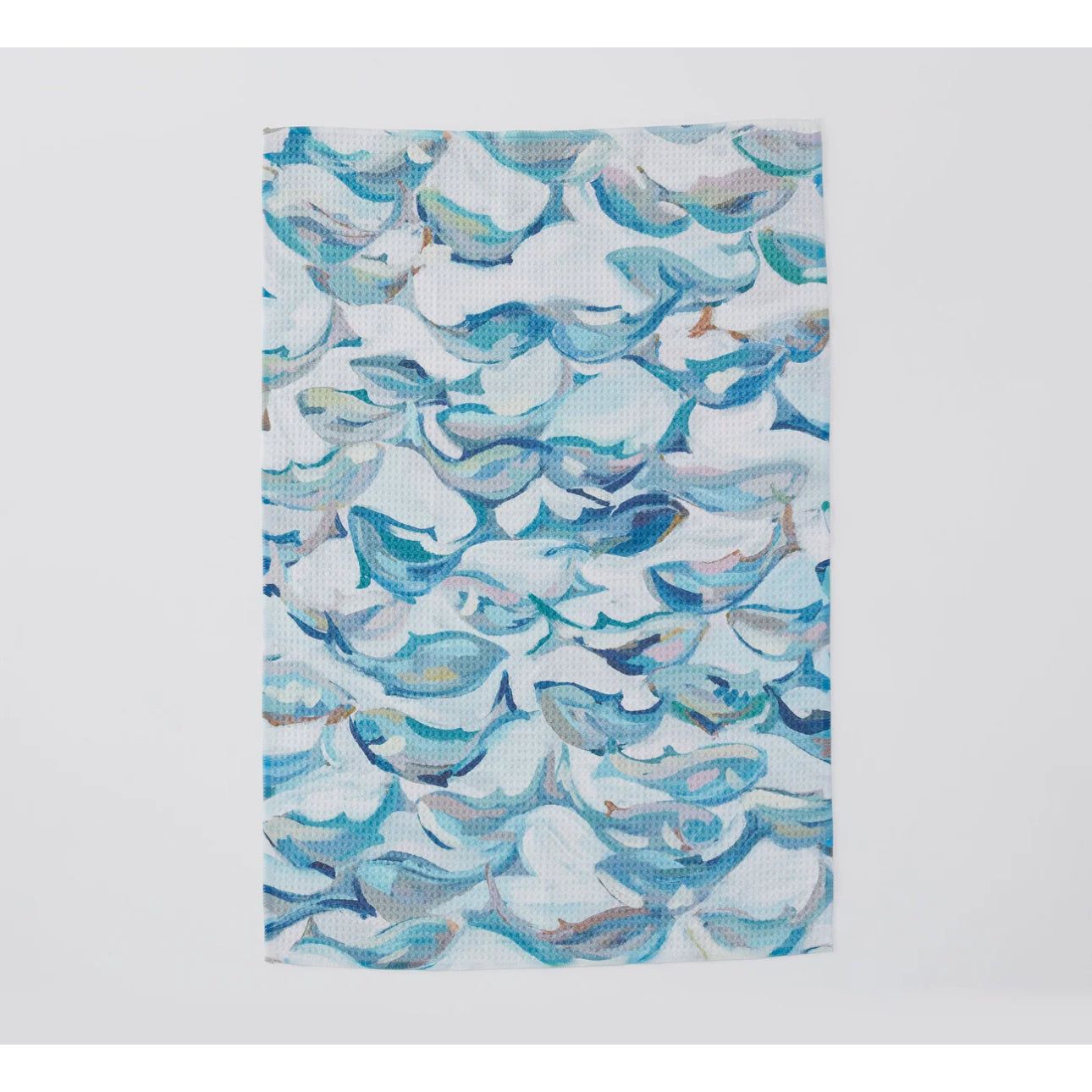 Whale towel shown in hives of blues and purples  
80% durable woven polyester/ 20% polyamide blend microfiber
Dimensions: 16" x 24"
Print front and white back