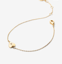 Dainty gold chain with small heart and a cz in center
