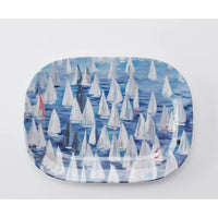 Set sail and a pop of color to your coastal table with the Race Day collection.   This melamine collection is great for indoor or outdoor entertaining in your coastal home.  This large platter has a blue background with sailboats all over.