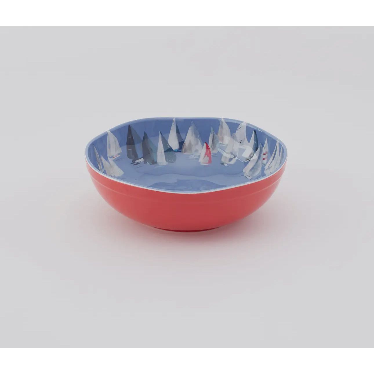 Set sail and a pop of color to your coastal table with the Race Day collection.   This melamine collection is great for indoor or outdoor entertaining in your coastal home.  Bowl is red outside with blue interior and sailboats 
Small bowl -Dimensions 7”x 2.5”