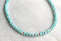 Gorgeous, natural dyed turquoise  jade, 5x8mm beads
•Adorned with 14kt gold plated accents
•Beaded by hand just for you
Water friendly
16”
Made in USA
Handmade
