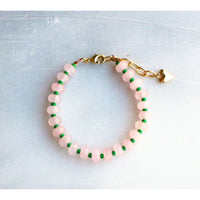 Gorgeous colorful stone candy jade is hand strung to create this beaded bracelet.  Layer these up or wear them alone, they are perfect for a stylish pop of color to your outfits! 
__________________
D E T A I L S
•Colorful jade strung by hand 
•18kt gold filled closure and heart charm
•Available in a 6.5 inch length with a 1.5 inch extender