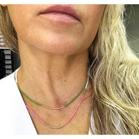 Pink necklace shown at 18 inches layered with gray necklace shown at 16 inches