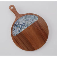 Original Kim Hovell Artwork: Pewter Shells
Dimensions: 10" x 4"
Material: Acacia wood with enamel with all over oysters. 
Serving Board-19” diameter 
Utensils 10”x 14”