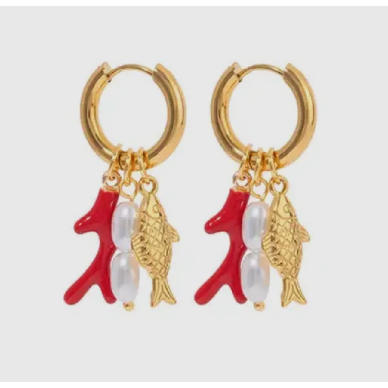 Gold plated hoop water proof fish shaped earrings with orange coral and pearls. Each charm can be worn together as shown or separately on the hoop