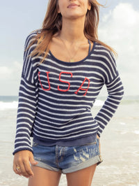 Crafted from our soft, light, and breathable cotton blend, this blue and white striped sweater delivers effortless comfort and versatility for the season. The embroidered red “USA" graphic adds a bold, patriotic touch, making it a standout choice for any casual occasion. Featuring a classic crewneck, side slits, and rolled edge cuffs
Composition: 60% cotton, 40% acrylic
