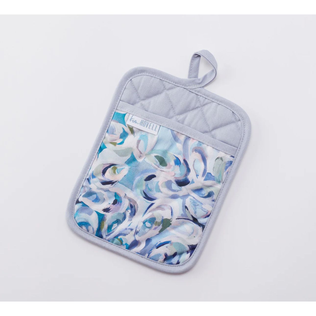 Designed by Kim Hovell, this Atlantic Reef potholder features a 100% polyester fleece front and a 100% polyester sherpa back. Measuring 7x9 inches, it is perfect for protecting your hands while cooking. Channel your inner beach vibes with this playful and practical potholder.