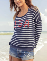 Crafted from our soft, light, and breathable cotton blend, this blue and white striped sweater delivers effortless comfort and versatility for the season. The embroidered red “USA" graphic adds a bold, patriotic touch, making it a standout choice for any casual occasion. Featuring a classic crewneck, side slits, and rolled edge cuffs
Composition: 60% cotton, 40% acrylic