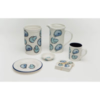 No shuck needed for this coastal oyster see.  White base with purple and blue painted  oysters.  Whole collection shown. Croc, pitcher, coaster, mug, tasting dishes