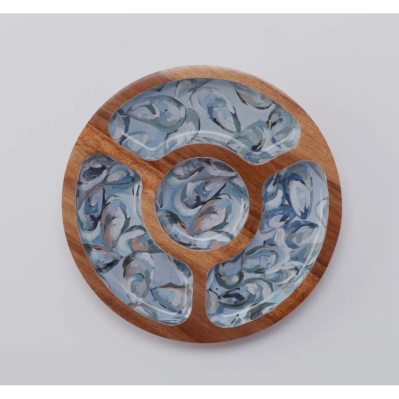 Original Kim Hovell Artwork: Pewter Shells
Dimensions: 10" x 4"
Material: Acacia wood
Divided into 3 sections enamel with all over oysters 
Snack Tray-12” diameter 
Serving Board-19” diameter