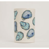 No shuck needed for this coastal inspired crock.
PERFECT FOR GIFTS!
Crock-
Add a whimsical yet stylish touch to your home decor with a kitchen crock, serving as a functional and decorative storage solution for utensils while effortlessly enhancing the charm of your culinary space.
8″ spouted Earthenware pottery multi-use crock
Dishwasher and microwave safe
Makes a great wine cooler or utensil holder