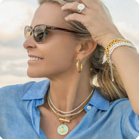 Showing oyster pendant on model