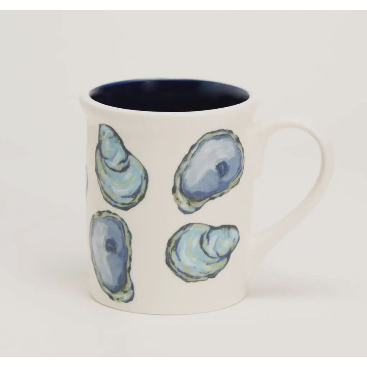 Mug -Round 14 oz. Earthenware Mug
Dishwasher & Microwave Safe
Allover Oyster Design with White Handle & Coordinating Interior Color