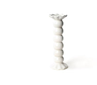 Create a show stopping table scape with these hand painted and hand sculpted candle sticks  to bring a one of a kind look to your home decor.  These candle sticks are designed to mix and match with other colors and sizes to create your best table scape yet.
Large white shown 
Hand wash
Large-3.5 diameter x 10.75” high 
Medium-3.5 diameter x 7.5” high