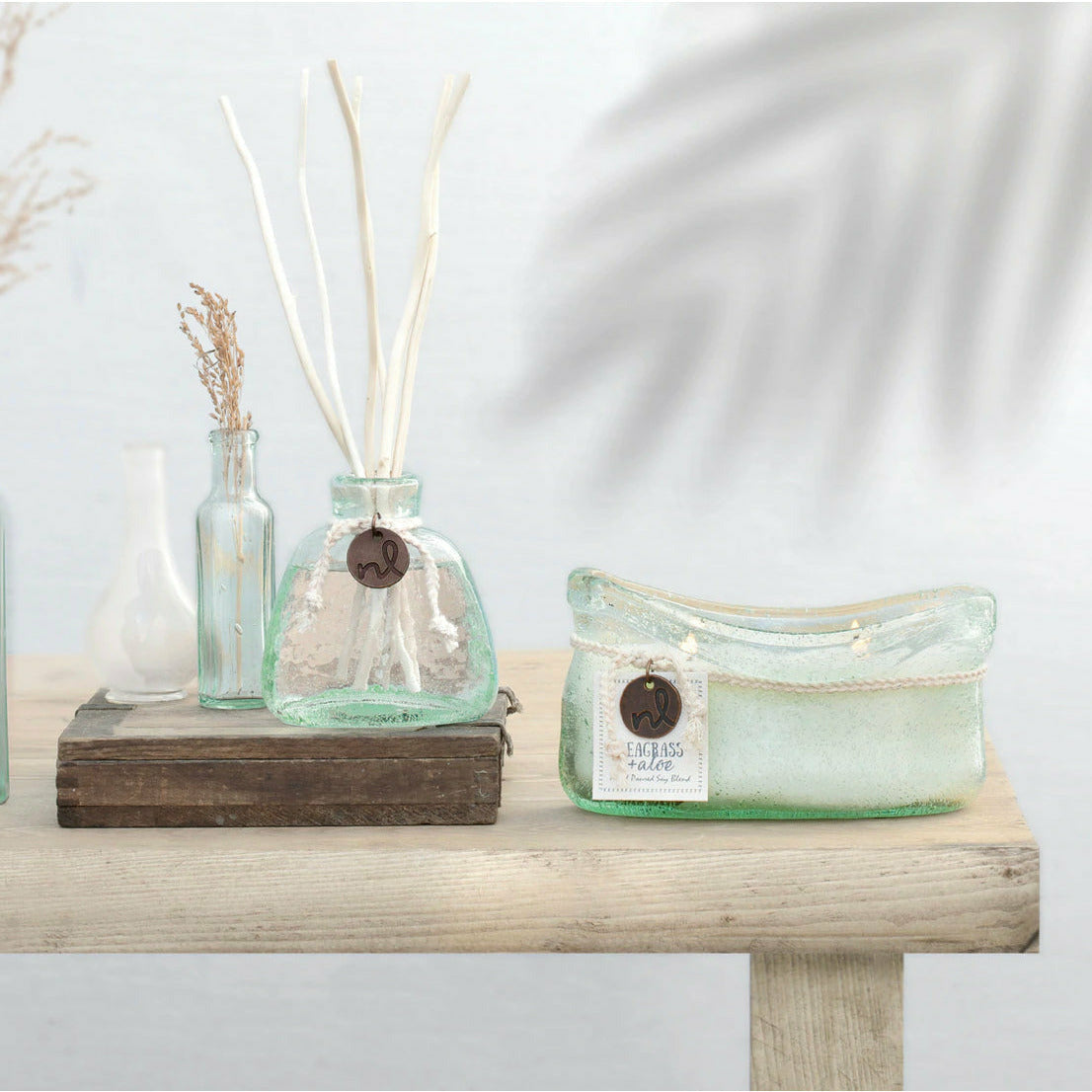 Candle and diffuser shown