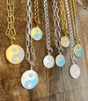 Forever in our hearts Lola charms shown on necklaces Sterling silver and gold 