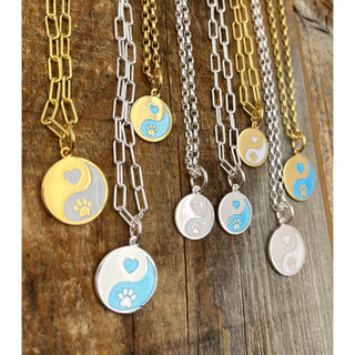 Forever in our hearts Lola charms shown on necklaces Sterling silver and gold 