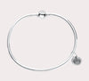 The original design of the Cape Cod Jewelry®️ line, with a sterling silver bangle and single ball available in sterling silver, 14k yellow gold.  Silver shown 