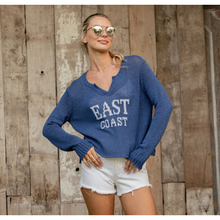 East Coast V Sweater – Cool, Cropped & Coastal blue with white lettering 

East Coast lovers, this one’s for you. The East Coast V by Wooden Ships is the ultimate warm-weather sweater, featuring bold knit-in lettering and a breezy, lightweight feel. Made with Wooden Ships’ signature cotton blend yarn, this cropped, boxy silhouette 