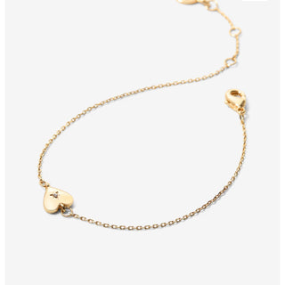 Dainty gold chain with small heart and a cz in center 