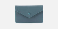 Shown in agave leaf which is a smoky blue color 