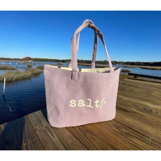 This top selling bag is perfect for days on the beach, boat or running errands.  

Durable cotton canvas bag imprinted with the words, "SALTY". Thick & cushioned 12" Shoulder length handles
Light purple shown 