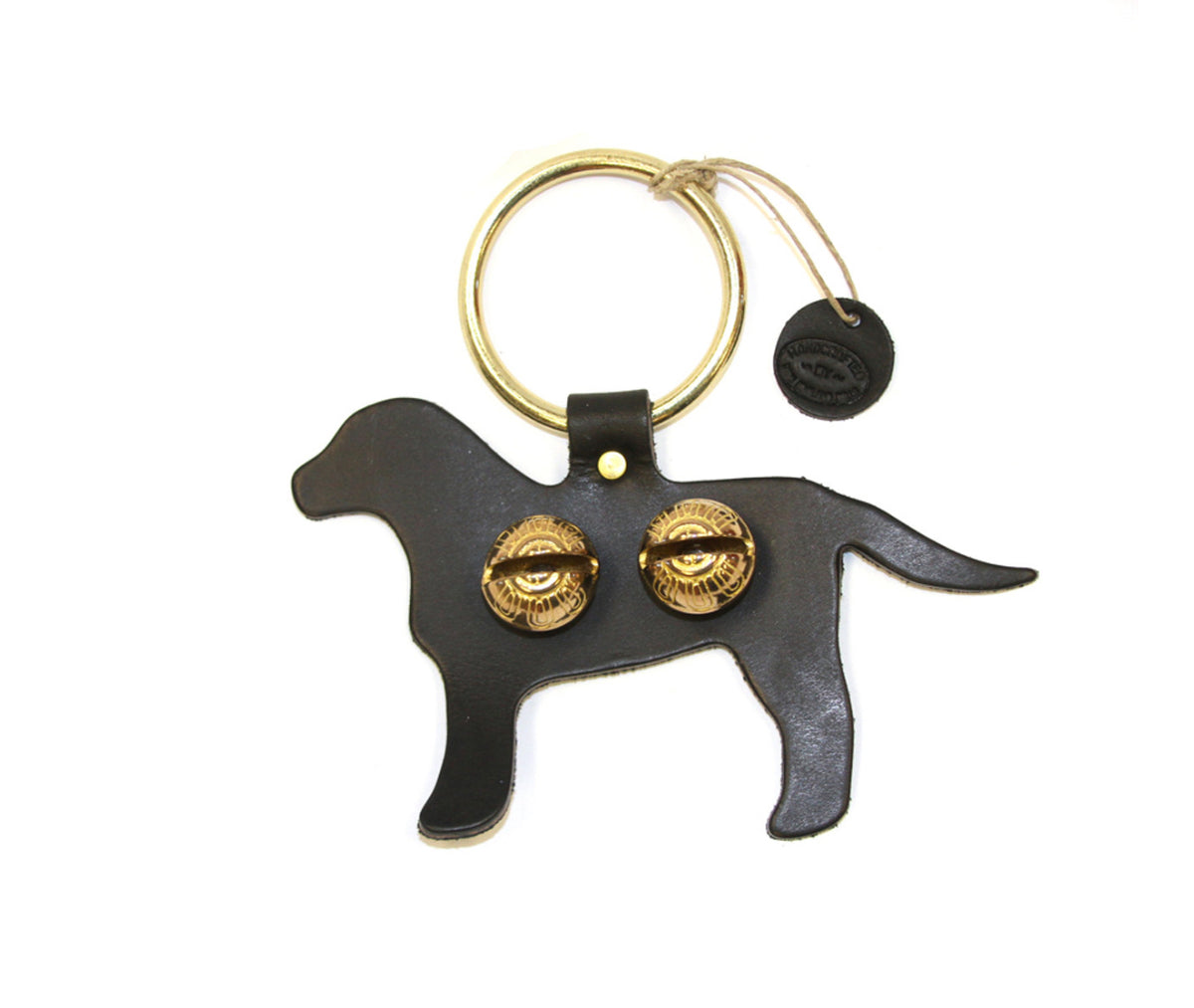 Brown Lab shown 

Each of these creations are stamped out of authentic leather. We then use an old-fashioned, foot powered, riveter to attach the 2 1/2” ring.

After the ring is attached, we add two of the popular #1 bells, with easy to remove, patented design pins, for quick cleansing. Each product has a hand punched and stamped leather tag affixed to the ring.