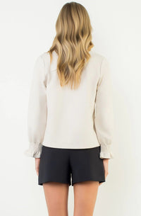 Shown from behind spotted with black 