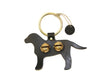 Black Lab shown 

Each of these creations are stamped out of authentic leather. We then use an old-fashioned, foot powered, riveter to attach the 2 1/2” ring.

After the ring is attached, we add two of the popular #1 bells, with easy to remove, patented design pins, for quick cleansing. Each product has a hand punched and stamped leather tag affixed to the ring.