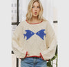 A cute graphic loose-fit sweater, perfect for your embracing your coastal lifestyle.   - Crafted with a cool-touch yarn that's perfect for spring and transitional weather. - The contrast color details on the sleeves, neckline, and hem add a playful pop to the look. 


 