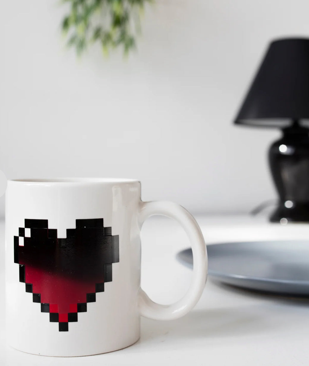 Fill Your heart mug with your favorite warm drink and watch the heart change from black to red. 


Reacts to heat, revealing new and fun graphics. Capacity: 11oz / 325ml

Design: KDT
Materials: ceramic, thermographic ink
Packaging: color box
Dimensions: 12 x 9,5 x 8 cm