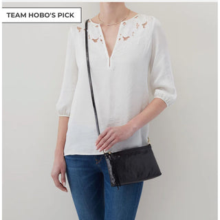 Worn as a long crossbody 