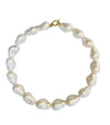Indulge in our latest obsession: the Ariel Pearl Collar. This gorgeous and stylish accessory is a must-have for any fashion-forward individual. You will love the statement and sophistication this piece adds to your outfit!

16" round
synthetic pearl. White 