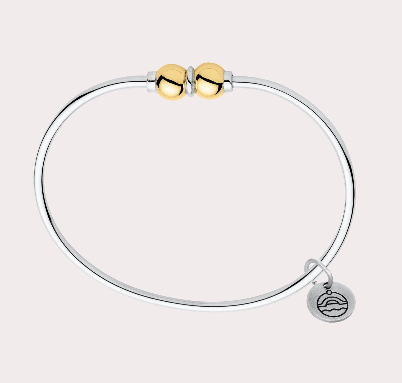 Add to your original design collection of the Cape Cod Jewelry®️ with a sterling silver bangle and double  ball available in sterling silver, 14k yellow gold.   Gold and silver shown