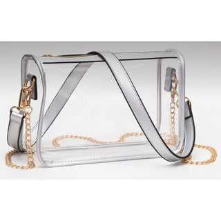 Showing silver table clear bag with silver strap or gold chain as an option 