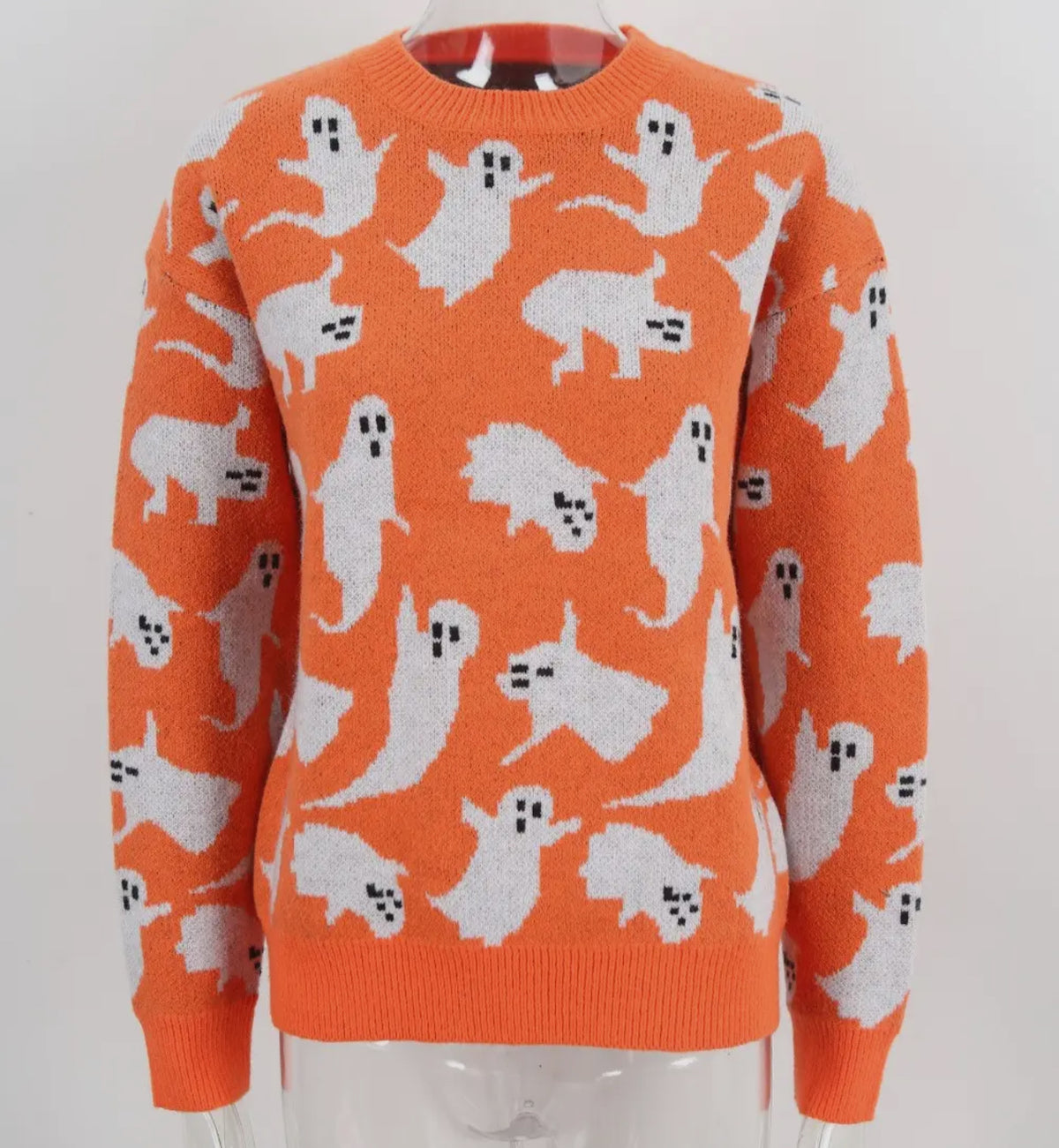 This cute Halloween ghost sweater, made of of recycled materials, will make you look as good as you feel. 

Orange sweater with white ghosts flying all over. 