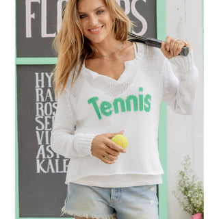 Effortlessly chic and refreshingly lightweight, this white V-neck sweater features the word “Tennis” in green knit directly into the front—perfect for sporty days. Crafted from breathable cotton, it has a relaxed silhouette with a flattering neckline that drapes beautifully, finished with ribbed cuffs and side slits.

 

SIZE	CHEST WIDTH (CM)	LENGTH (CM)
X/S	2-4	58.50	54.75
S/M	6-8	60.00	57.00
M/L	10-12	62.50	59.25
