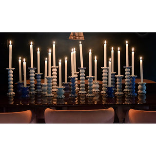 Create a show stopping table scape with these hand painted and hand sculpted candle sticks  to bring a one of a kind look to your home decor.  These candle sticks are designed to mix and match with other colors and sizes to create your best table scape yet   
Table with multiple candle sticks with lit candles shown 


Hand wash

Large-3.5 diameter x 10.75” high 

Medium-3.5 diameter x 7.5” high 

 