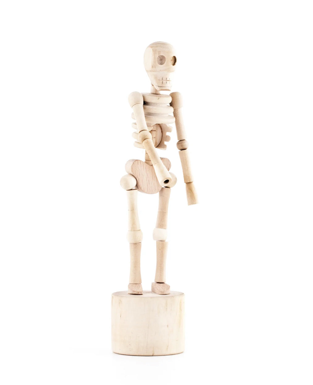 This wooden sculpture is strung togehter like a marionette from wihtin its skeletal frrame. Press the button at the base and the standing skeleton will collapse and dance.
Design: Chris Collicott
Materials: Wood, bean bags
Packaging: kraft window box
Dimensions: 19 x dia. 4,6 cm