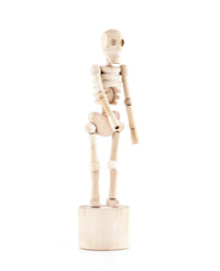 This wooden sculpture is strung togehter like a marionette from wihtin its skeletal frrame. Press the button at the base and the standing skeleton will collapse and dance.
Design: Chris Collicott
Materials: Wood, bean bags
Packaging: kraft window box
Dimensions: 19 x dia. 4,6 cm