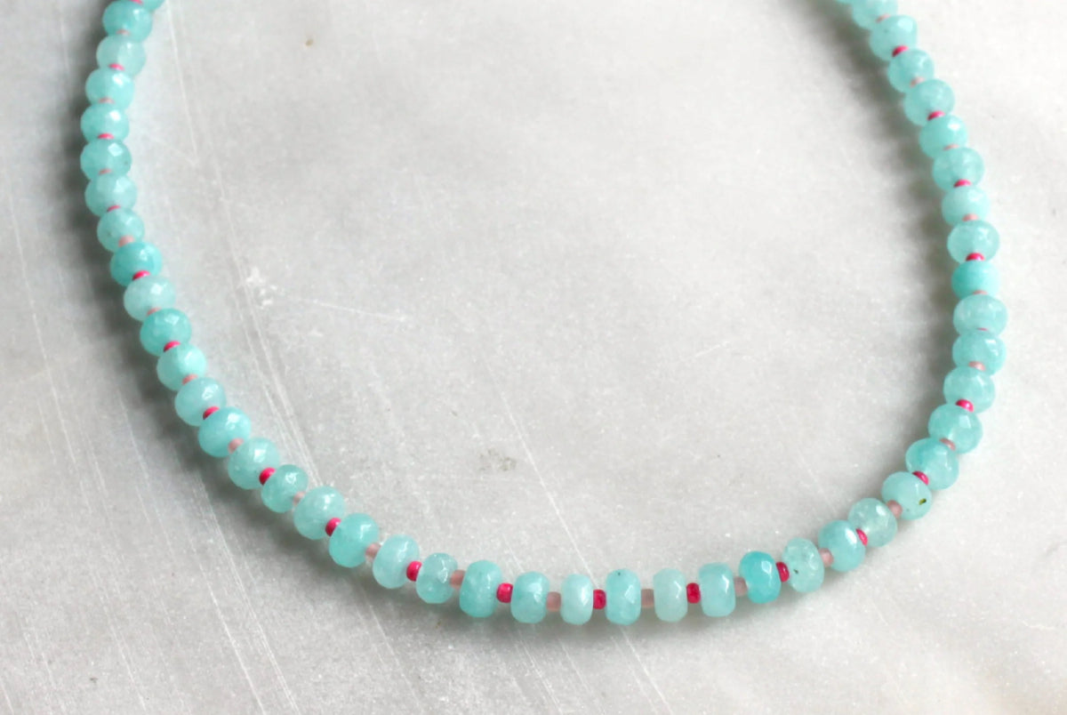 Gorgeous, natural dyed turquoise  jade, 5x8mm beads
•Adorned with 14kt gold plated accents
•Beaded by hand just for you
Water friendly

16”

Made in USA

Handmade