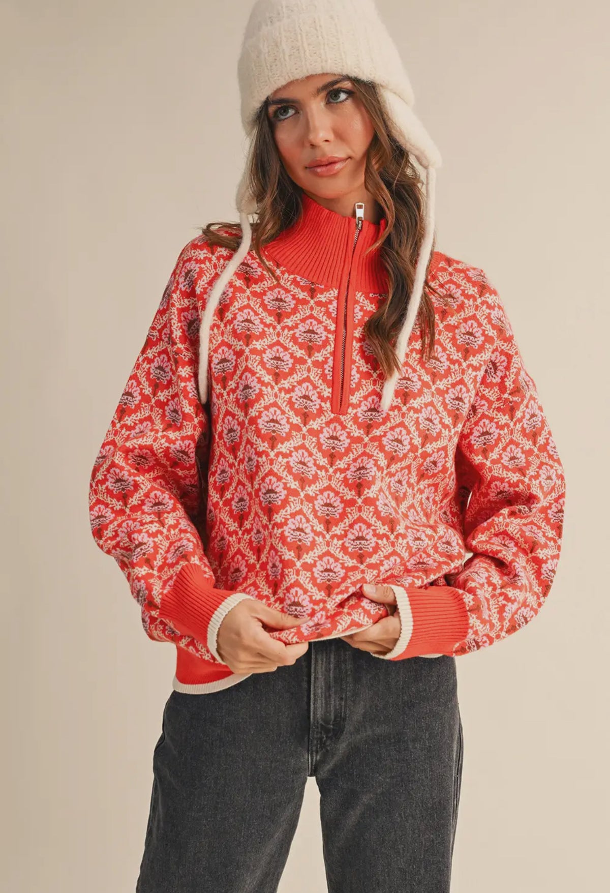 Whether  you are apple picking, walking in the crisp Fall air, skiing or curling up with a good book on a cold winter  day, this sweater is perfect for it all.  3/4 zip up. Solid Orange details on neck and wrists. 