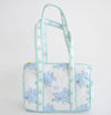 The sweetest shoulder bag with a classic, yet casual spin!  Pair it with the matching coin purse and duffle for a complete set.
100 percent cotton
Quilted texture 
13 inches long | 8 inches high | 7.5 inches deep
15 inch handle drop
Includes interior dual pocket
Mild hand-wash cold, hang dry and warm iron
Made with great care in India
Due to the nature of the printing, you may notice minor imperfections in the fabric.