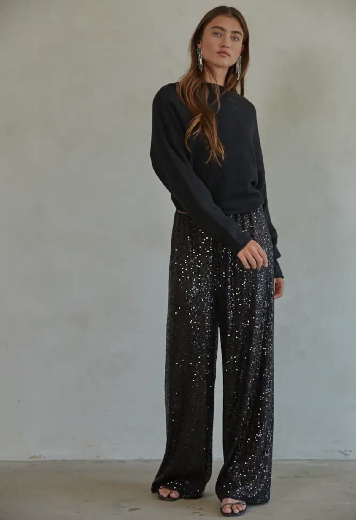 Shown on model with black sweater 