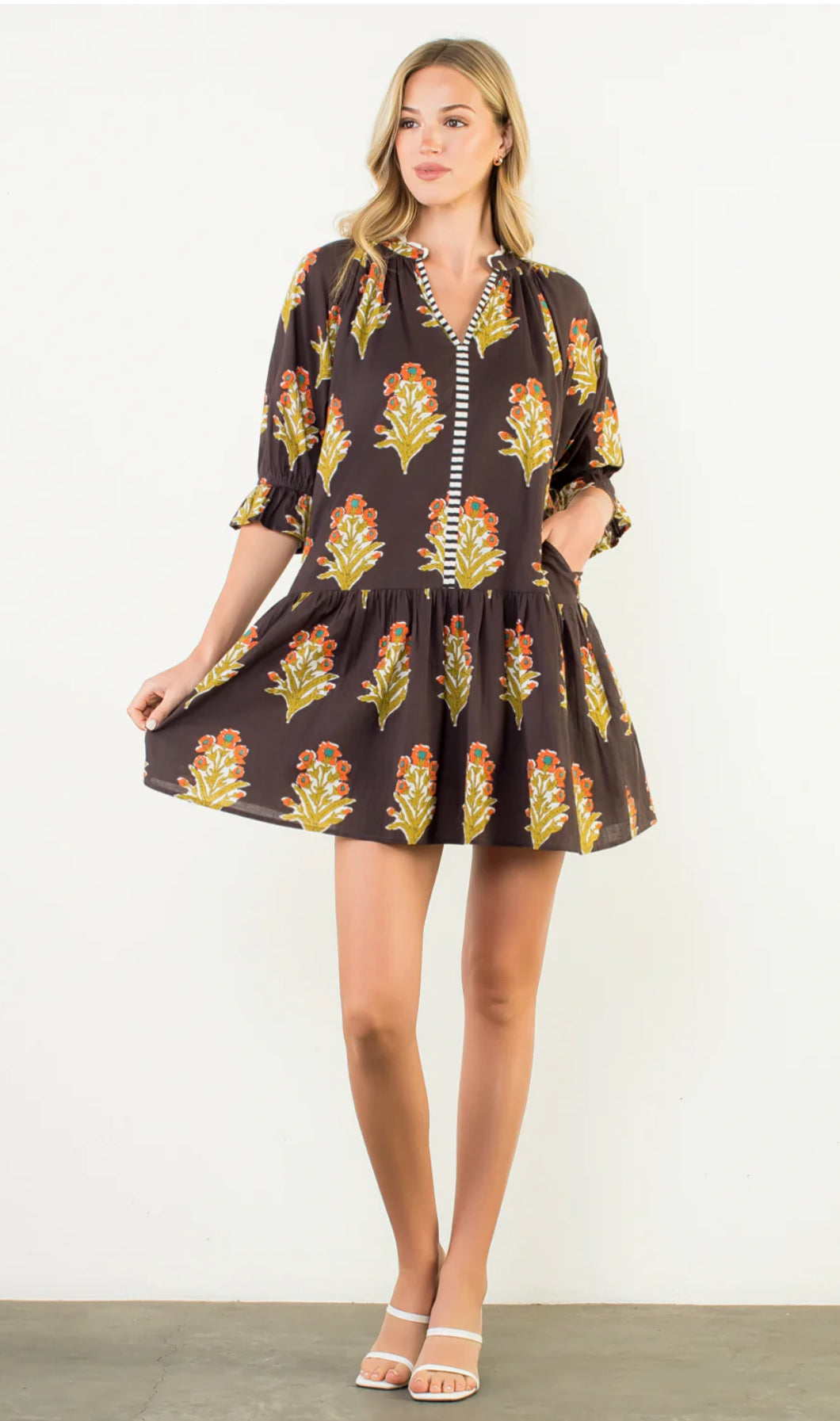 Showing that dress has pockets 