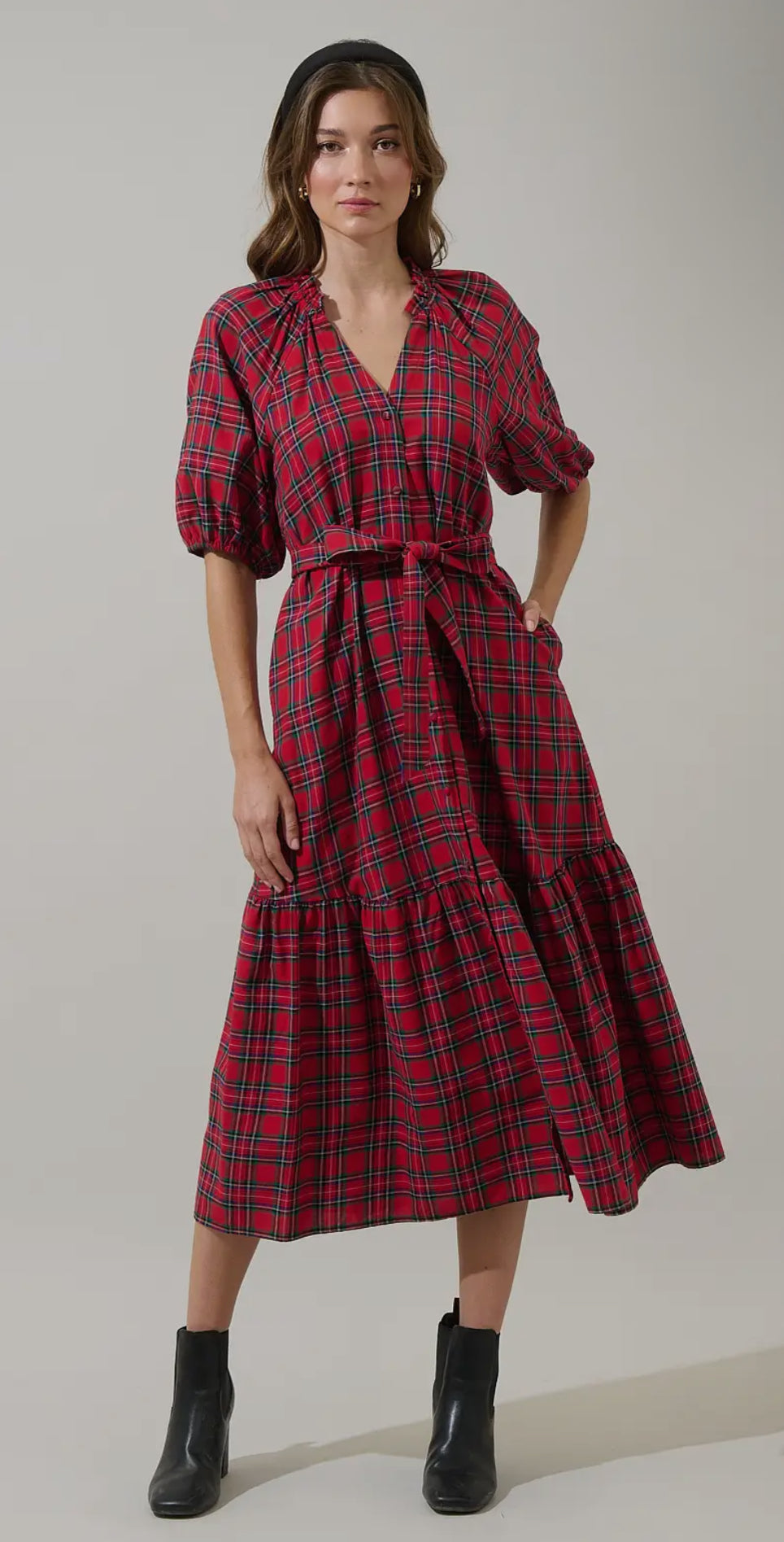Fall vibes. The Chapman Plaid Wynette Tiered Midi Dress has a pretty red multi design. Billowing puff sleeves join a classic style mid length dress with a functional button front. A waist tie adds shape, framing conventional side seam pockets. Pair the look with boots.

- Split neck
- Button front
- Tie belt
- Tiered
- Color: Red Multi

Size + Fit
- Model is 5'9" and wearing size XS
- Measurements taken from size S
- Chest: 19 3/4"
- Length: 49"